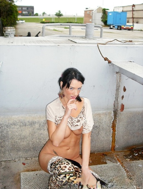 Brunette amateur exposes her wet pussy after drinking wine from coffee cups