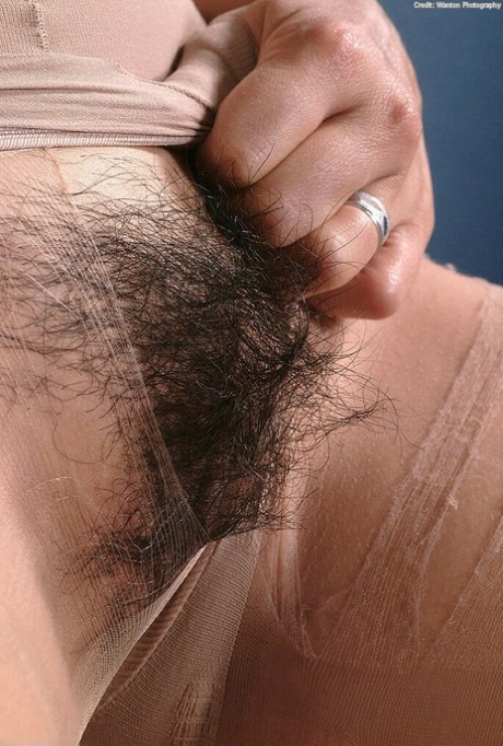 Cute Latina first timer Sexual rolling down pantyhose to expose hairy cunt