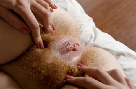Horny amateur teen Grace grabs her tiny tits and spreads her hairy pussy